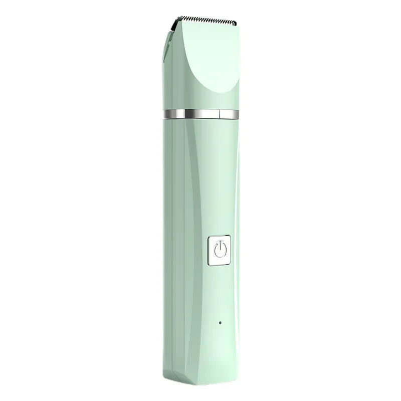 Mint green hair trimmer on a white background